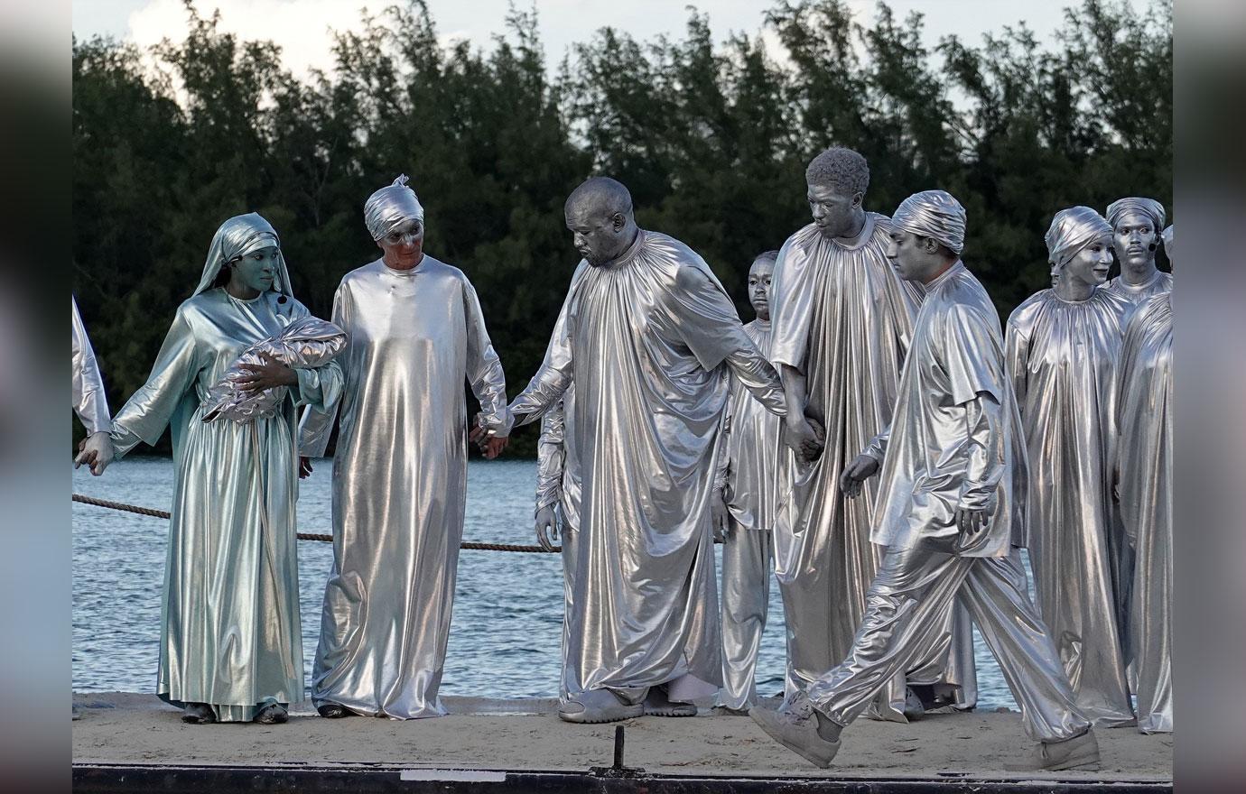 Kanye West Wears Silver Body Paint & Robe For Miami Opera