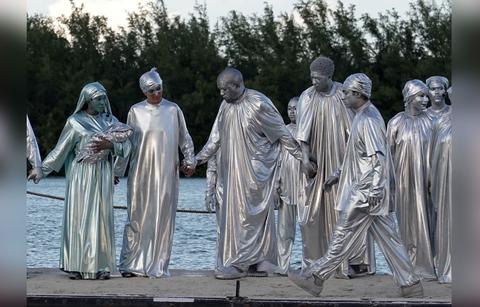Kanye West Wears Silver Body Paint & Robe For Miami Opera