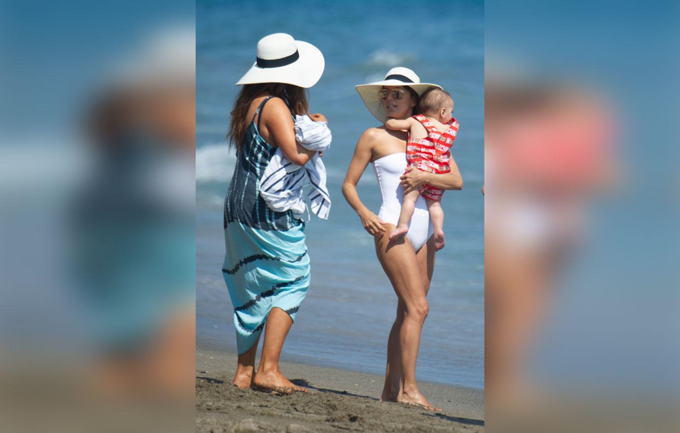 Eva Longoria Wears White Swimsuit On Beach With Baby Son