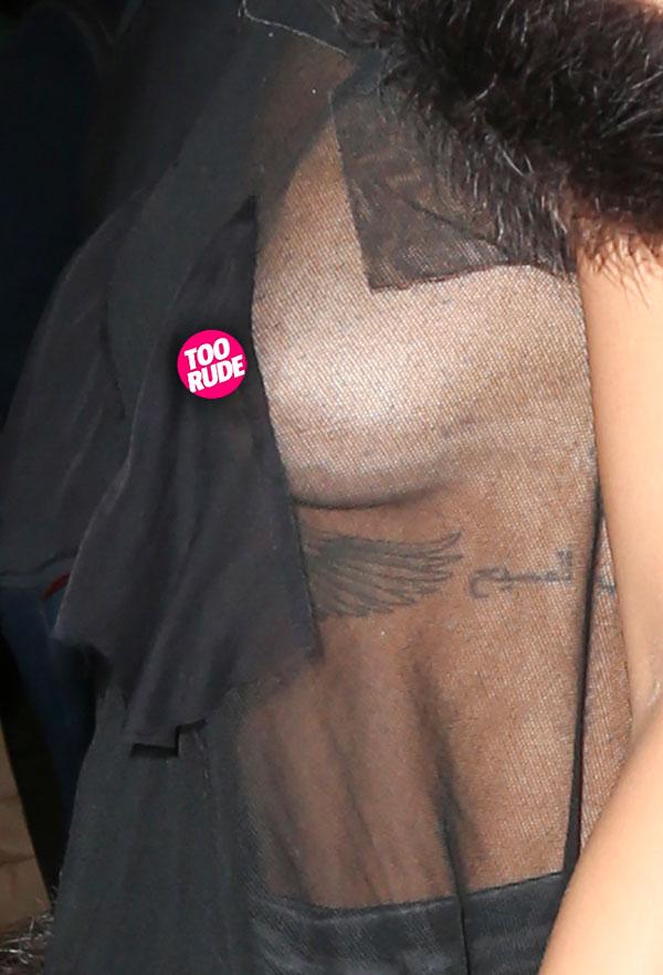 Rihanna wardrobe malfunction shows nipples in VERY see through bra