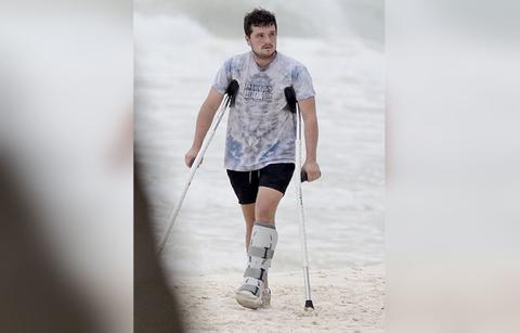 josh hutcherson hunger games injured mexico wearing medical foot photos jennifer lawrence