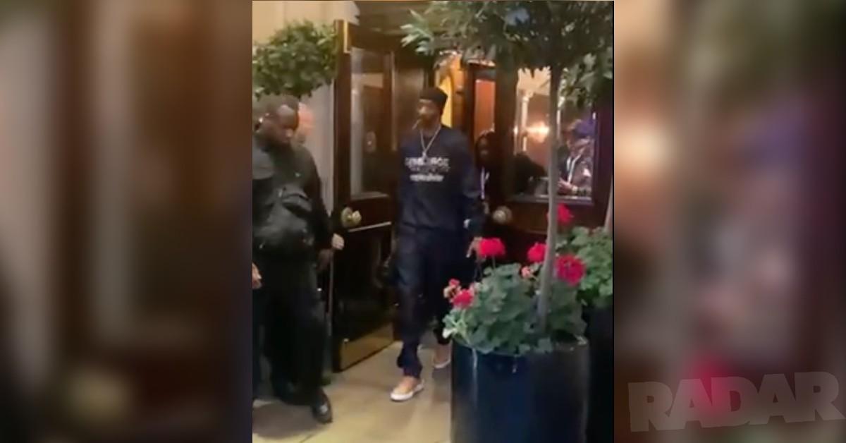 snoop smokes joint leaving hotel