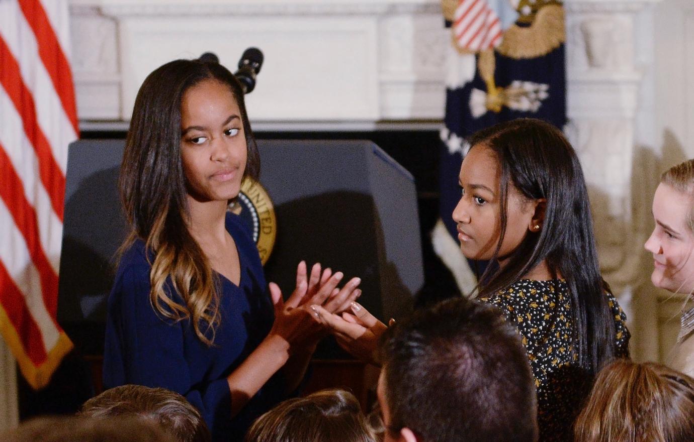 Malia and Sasha Obama looking bored at a White House event.