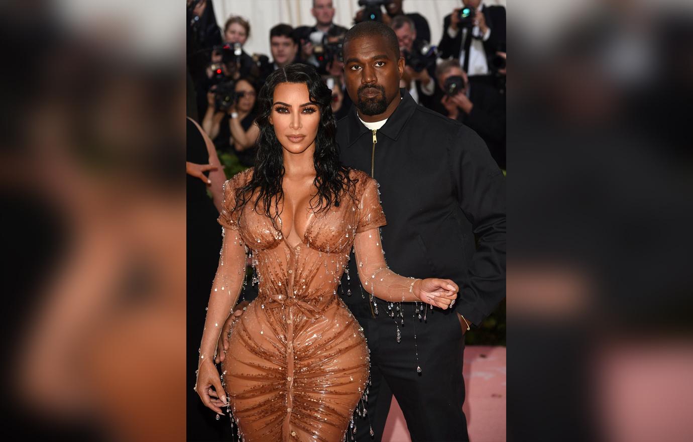 Kim Kardashian, Kanye West. Kim Kardashian, left, and Kanye West attend The Metropolitan Museum of Art's Costume Institute benefit gala celebrating the opening of the "Camp: Notes on Fashion"