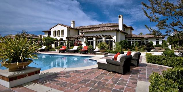 //khloe kardashian buys justin bieber calabasas mansion