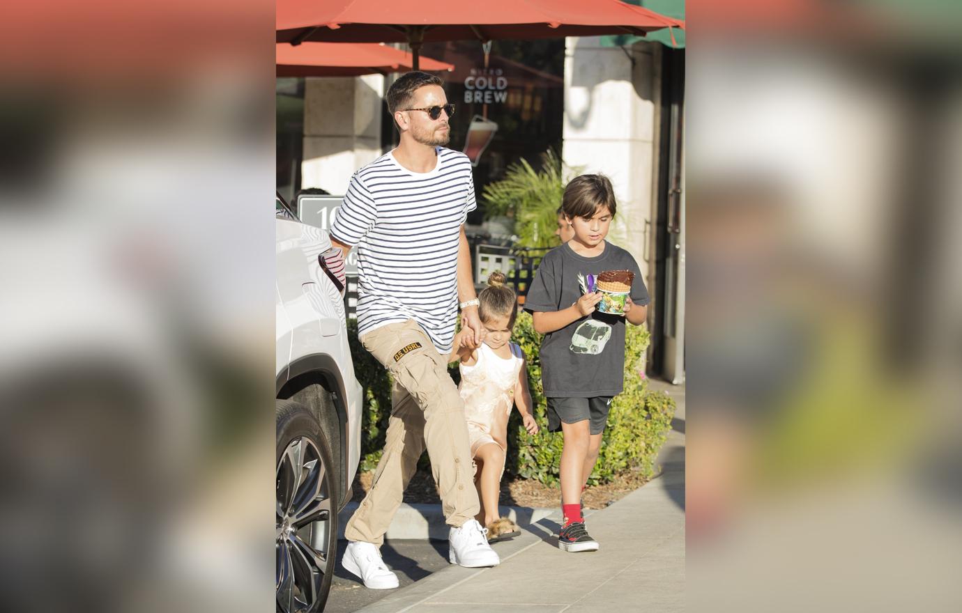 Scott Disick Watches Kids While Kourtney Kardashian Is In Paris