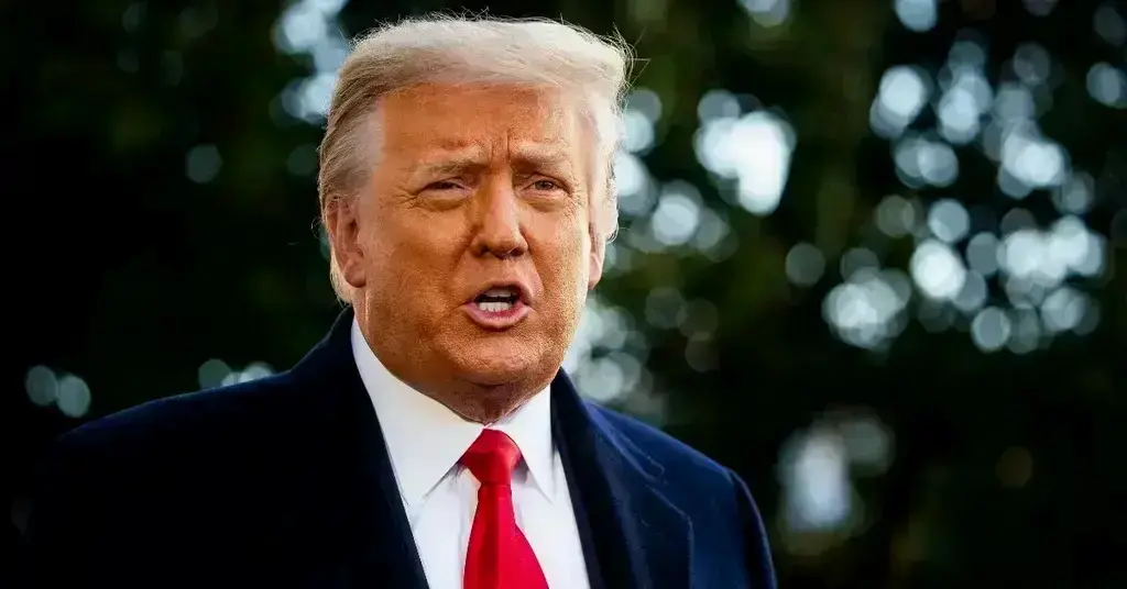 capitol rioter qanon shaman supports trump not his fault