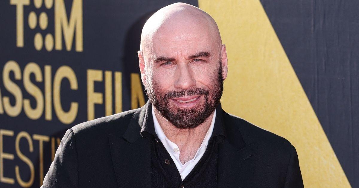 John Travolta has quietly become Deborra-Lee Furness' biggest supporter after her split from Hugh Jackman.