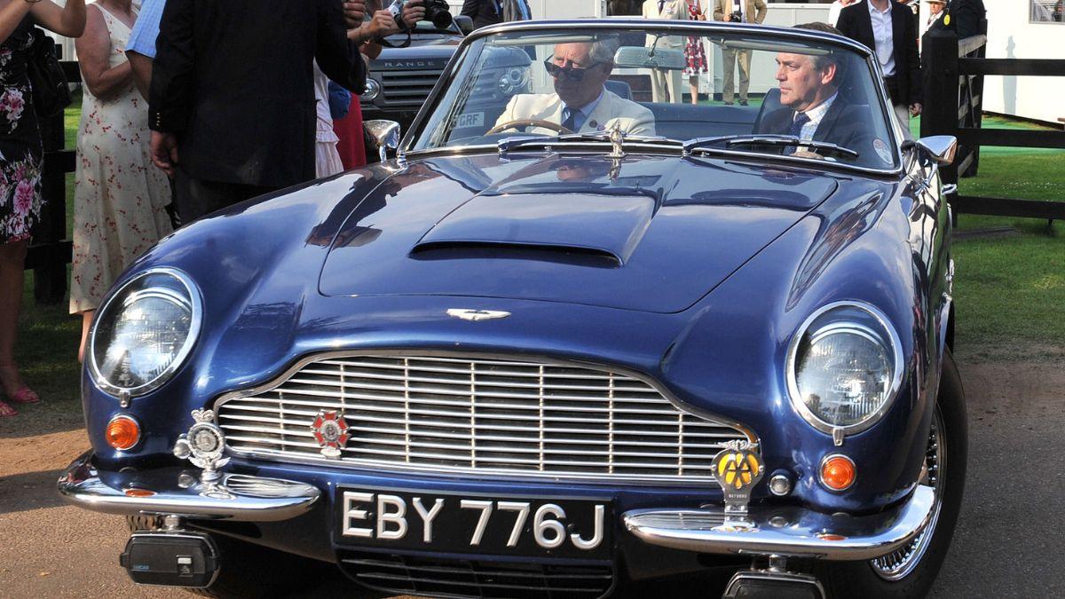 Photo of King Charles and his Aston Martin