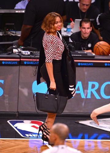 Beyonce Knowles and Jay-Z attend a Brooklyn Nets Game