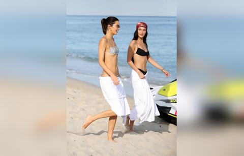 Kendall Jenner Straddles Bestie Bella Hadid During Hot Beach Trip