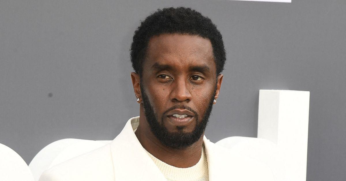 Sean "Diddy" Combs posing for photos at the Billboard Music Awards.