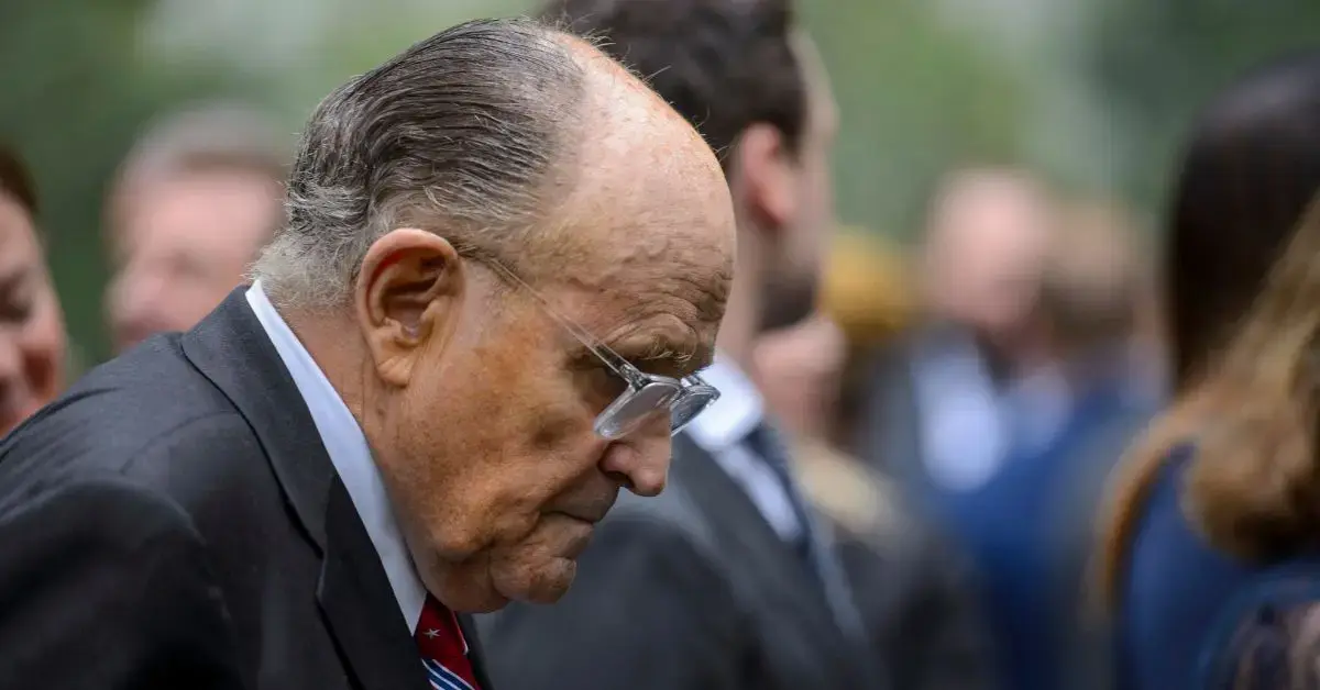 rudy giuliani surrenders to authorities