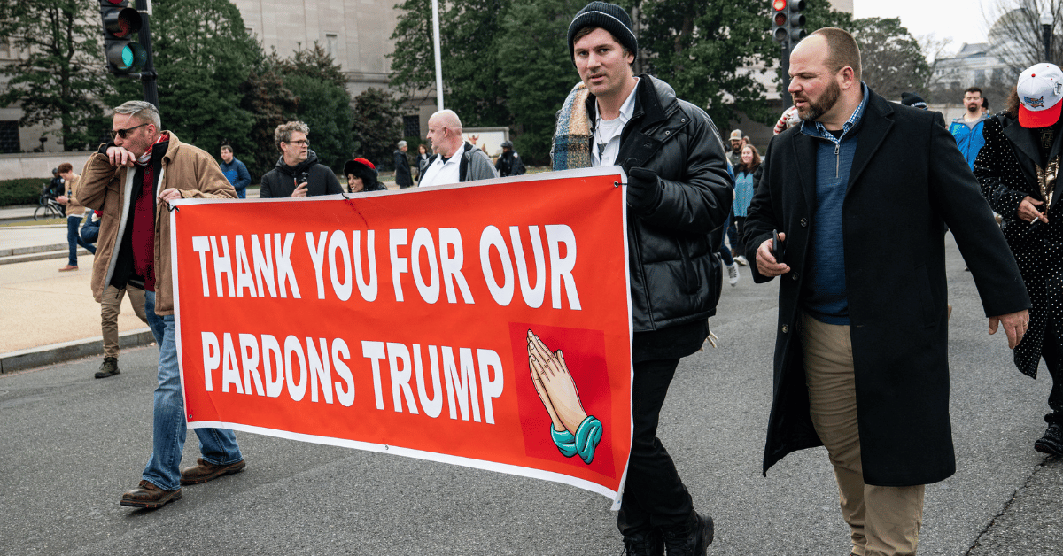 Photo of protestors marching in Washington D.C. on January 6, 2025