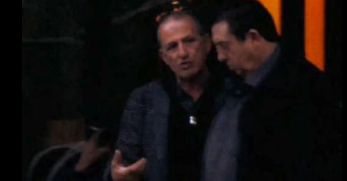 suspects meeting together at cafe