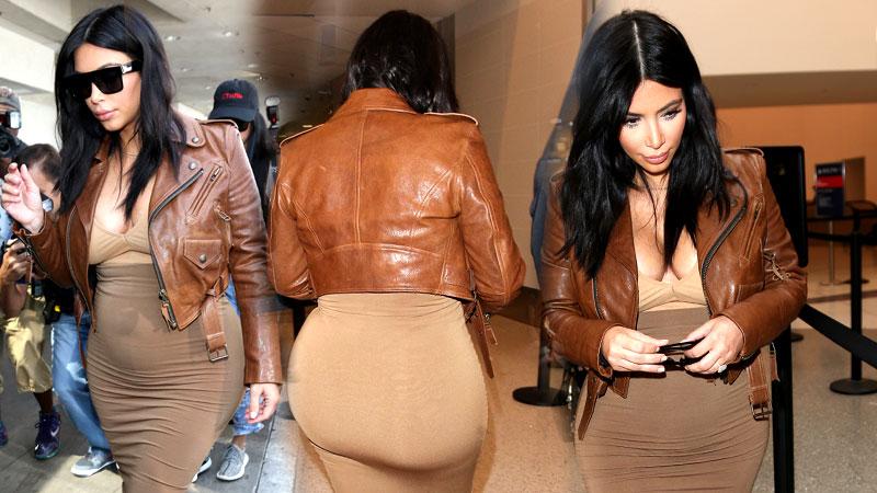 //kim kardashian pregnant baby bump lax brown dress leather jacket pp