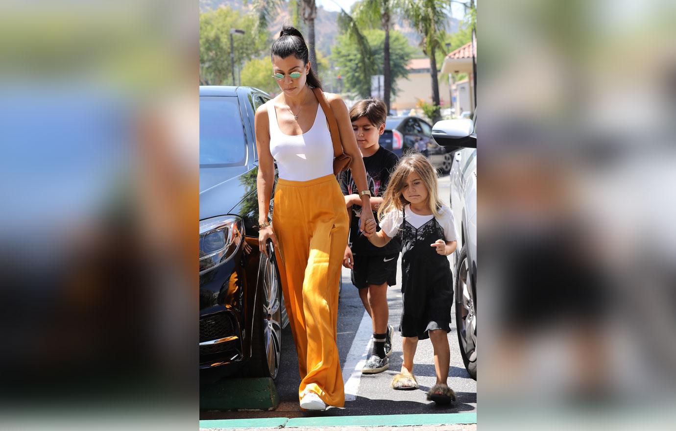 Kourtney Kardashian Goes Braless Yellow Pants