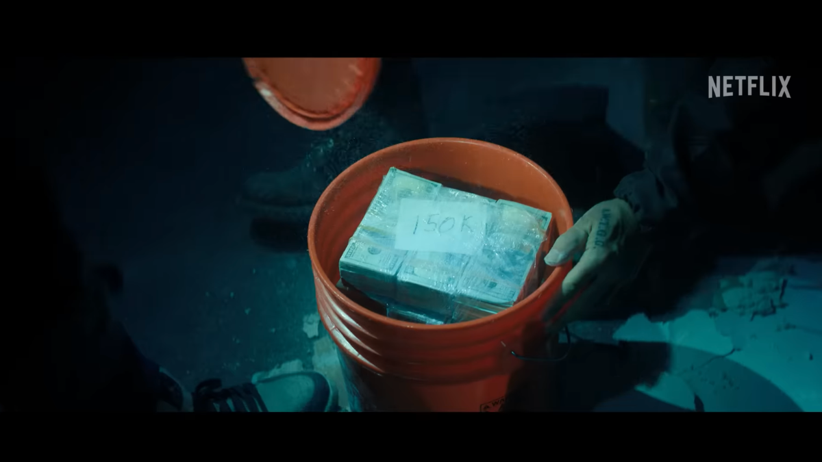 Millions in bundled cash stored in orange buckets 