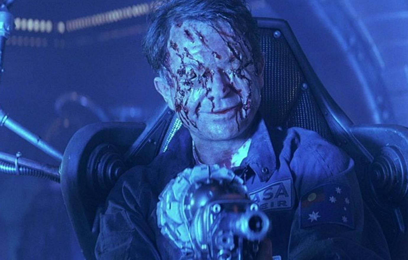 Event Horizon star Sam Neill found his character a little rough for the wear with bloody gouges across his face that didn’t stop his psychotic character from still smiling.