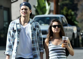 //mila kunis denies pregnant