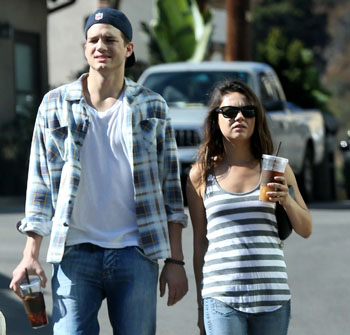 //mila kunis denies pregnant