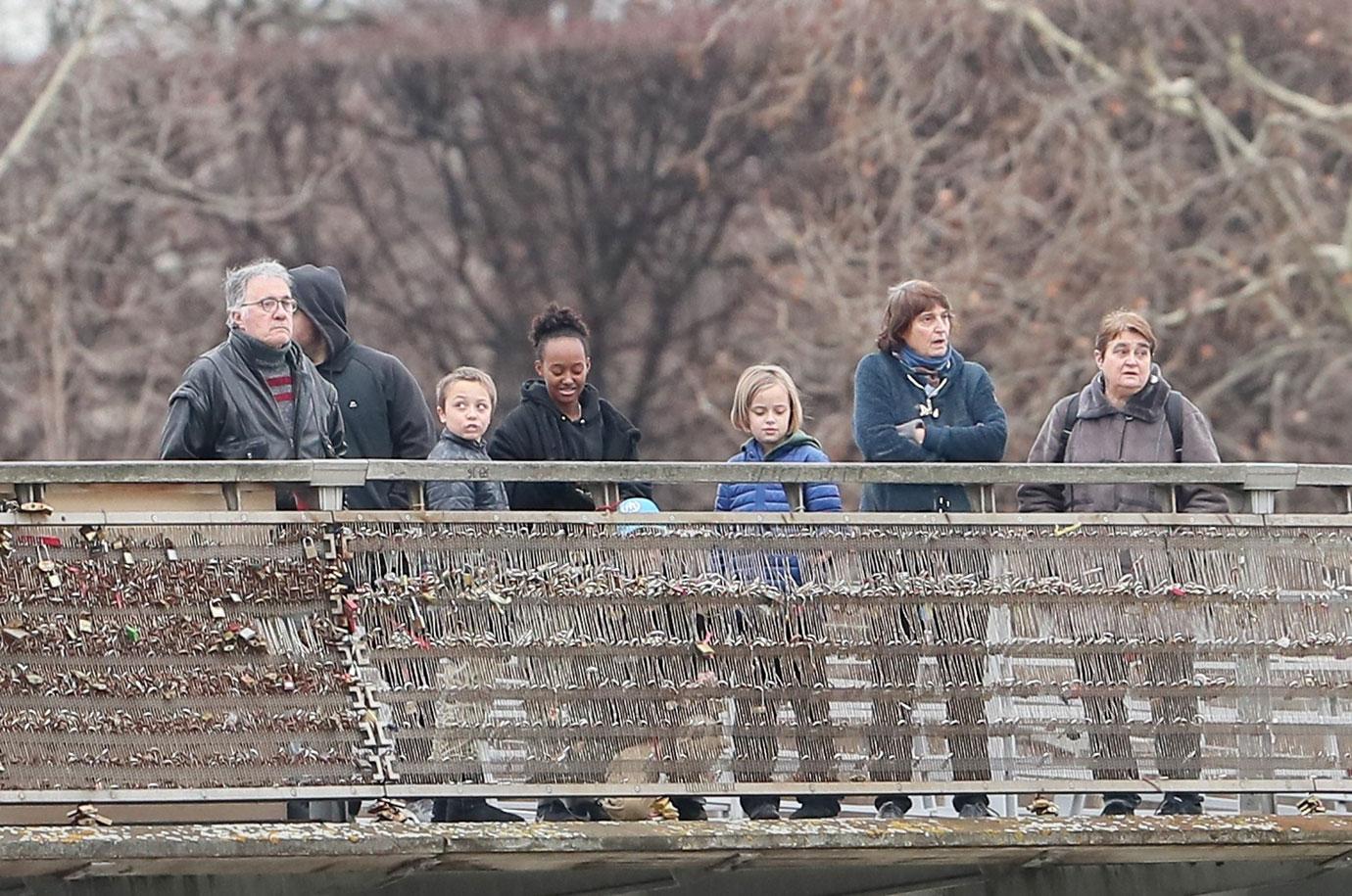 //angelina jolie kids play paris dad brad pitt home