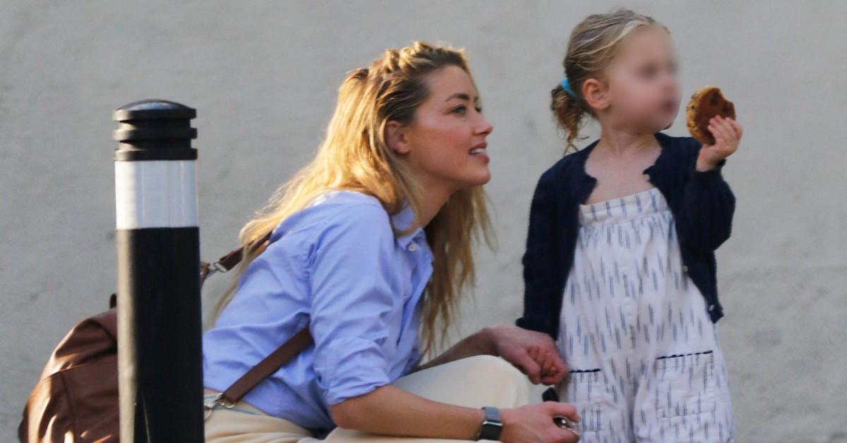 amber heard seen in madrid with daughter radar