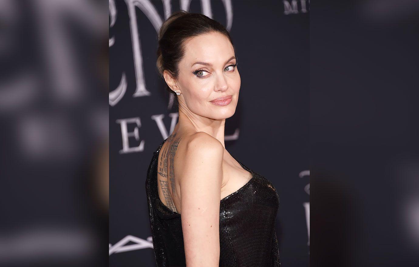 Angelina Jolie All Smiles At JFK Airport Amid Divorce Drama
