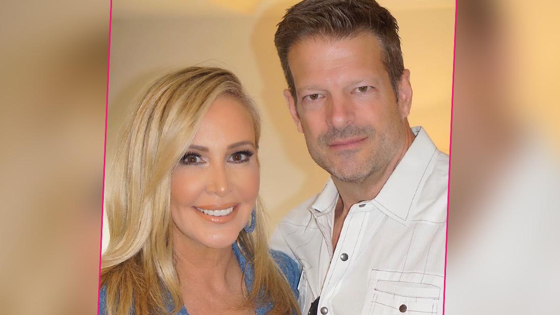 Shannon Beador and John Janssen pose for a photo.