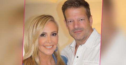 Shannon Beador and John Janssen pose for a photo.