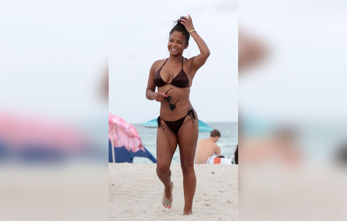 Christina Milian Shows Nipple Ring In Tiny Bikini During Miami Beach Day