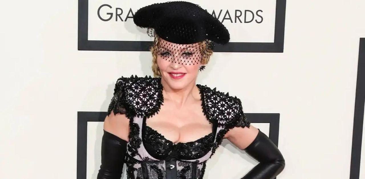 madonna removes luther vandross photo from aids tribute