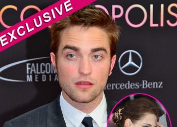 //pp_robertpattinsonslowdown_wenn