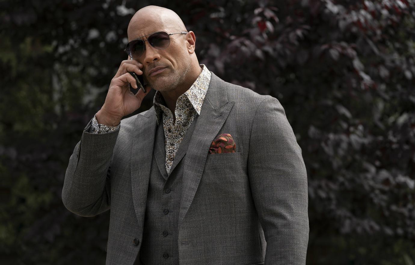 Dwayne Johnson starred in Ballers and looked the part in a grey three-piece suit.