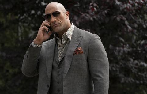 Dwayne Johnson starred in Ballers and looked the part in a grey three-piece suit.