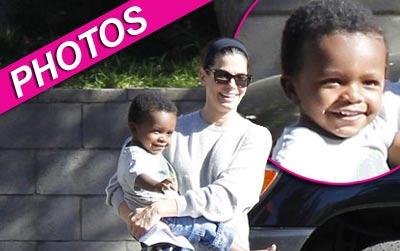 //sandra bullock louis bardo smiling fame