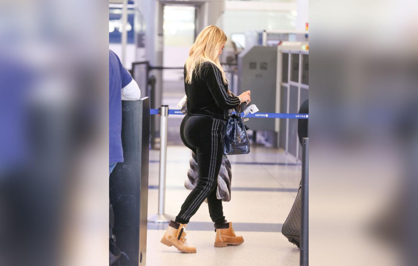 //khloe kardashian flaunts pregnancy curves at lax