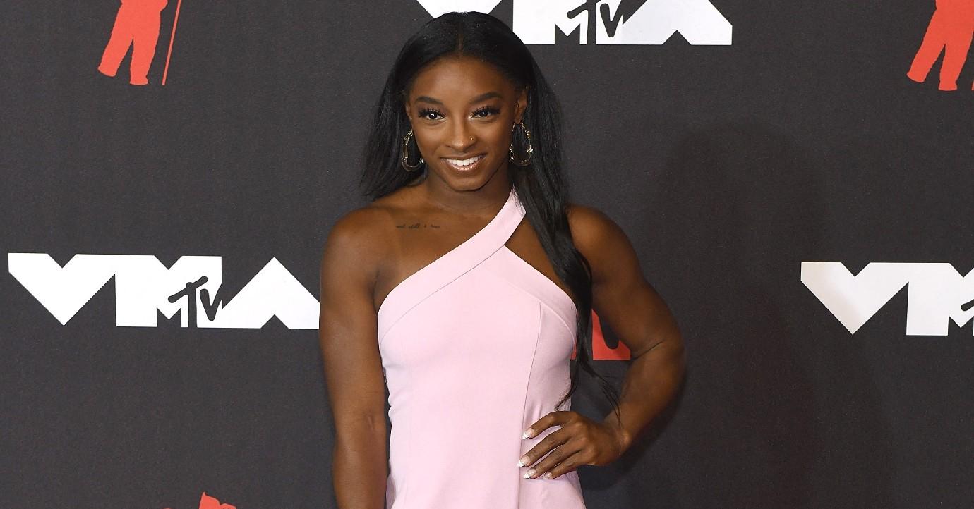 simone biles pennyless biological mom living in poverty