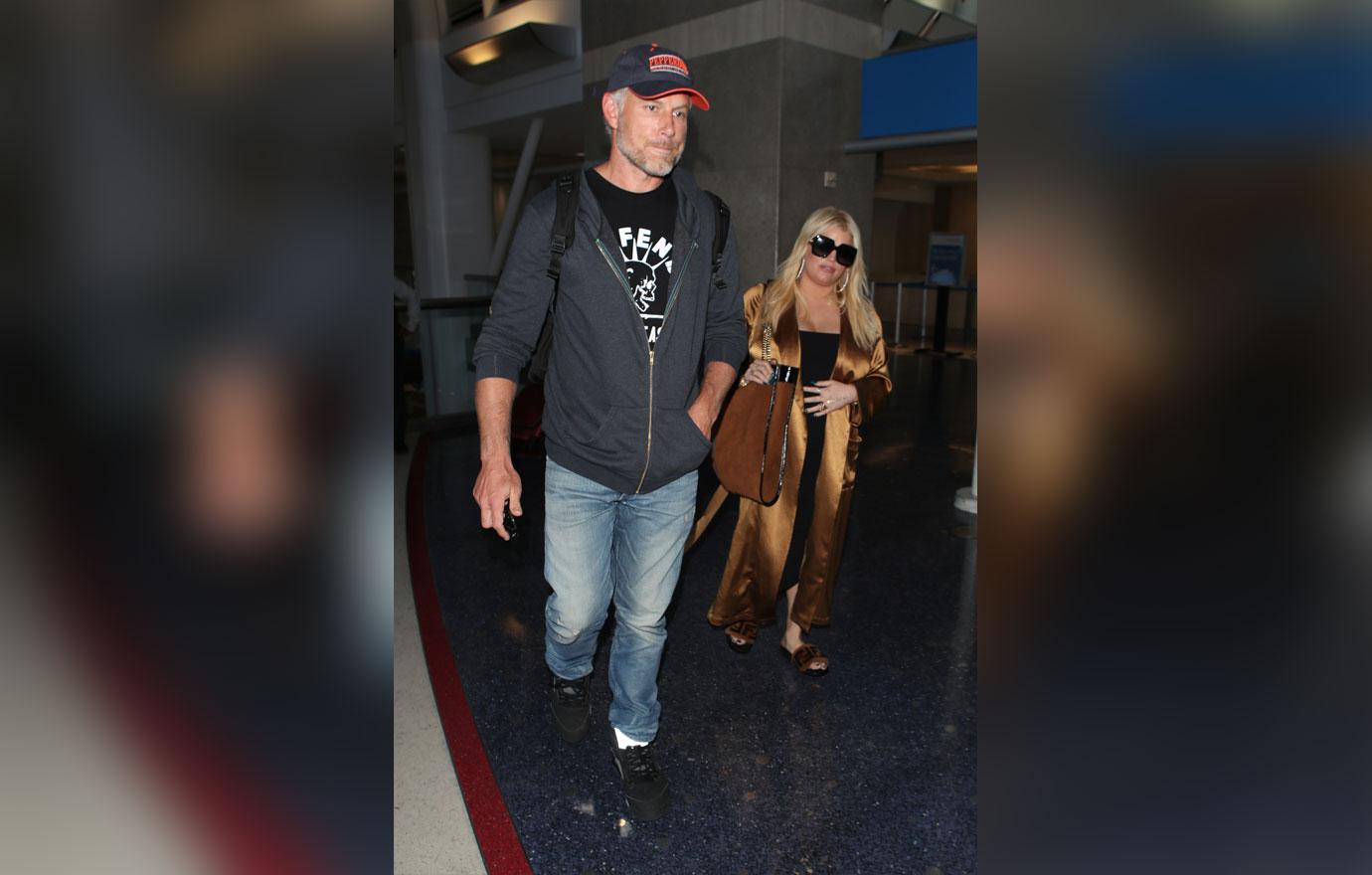 Pregnant Jessica Simpson And Husband Seen At Airport