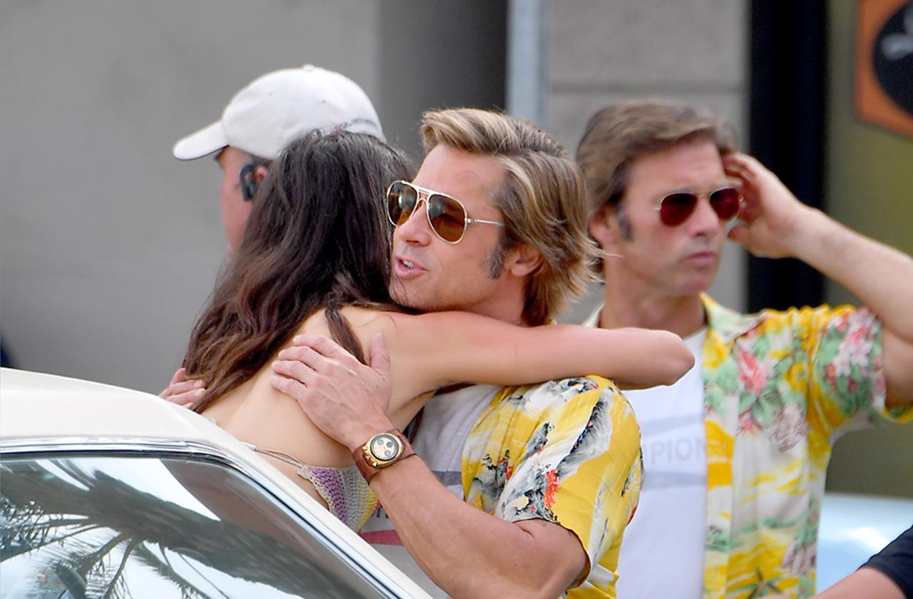 //brad pitt hugs female co star on once upon a time set pp