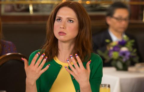 Ellie Kemper, who wore a green sweater over a yellow shirt, had a moment in Unbreakable Kimmy Schmidt.