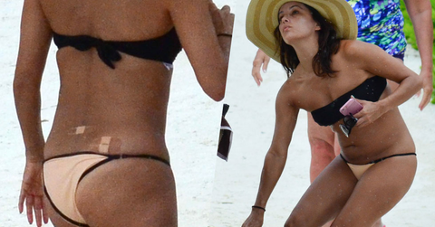 //eva longoria removing lower back tattoo tramp stamp