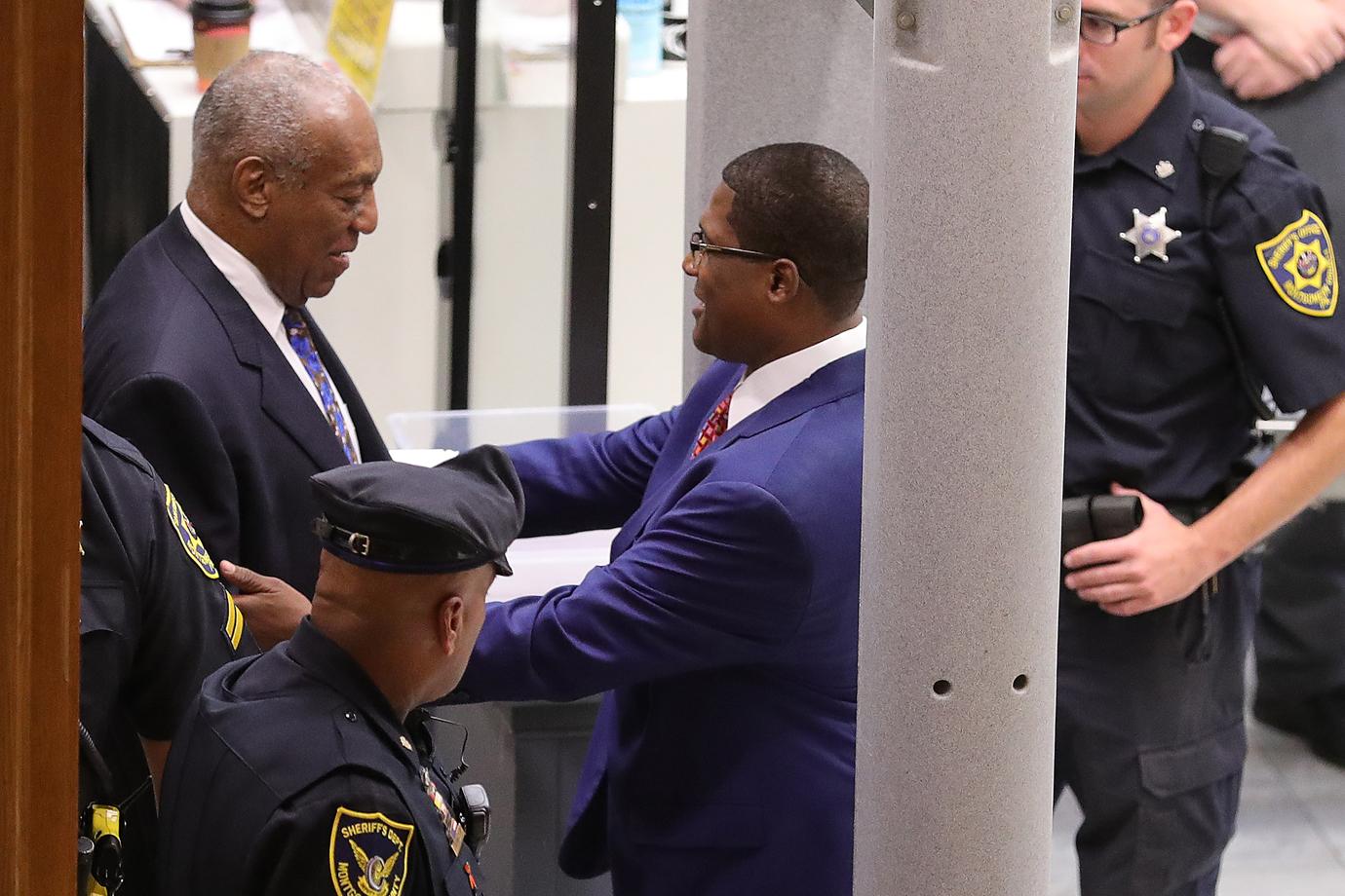 bill cosby handcuffed first photos no bail prison sentence