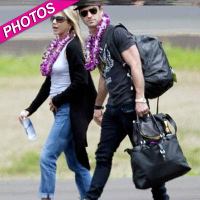 Jennifer Aniston and Justin Theroux sizzle in matching leather on