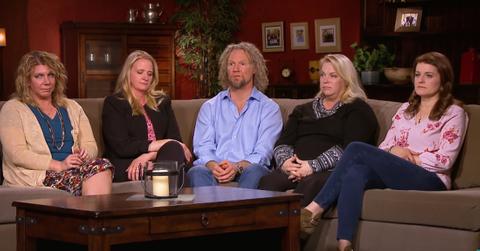 Kody Brown wears a blue shirt while seated next jenelle brown who wears a black sweater and a long sleeved shirt.