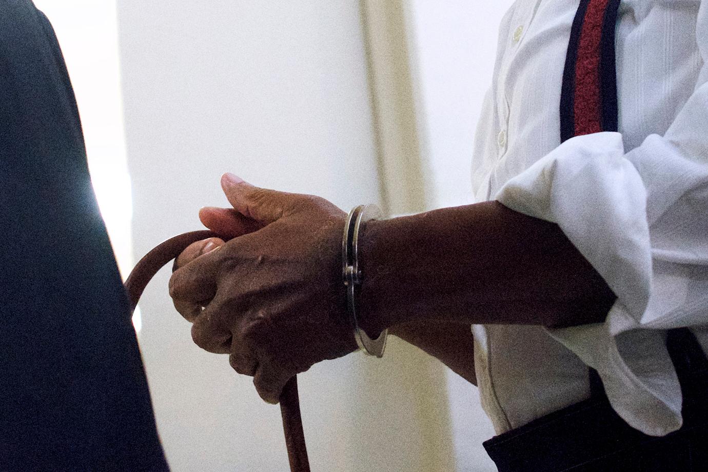 bill cosby handcuffed first photos no bail prison sentence