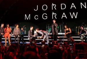 jonas brothers surprise tourmate jordan mcgraw with birthday cake  x