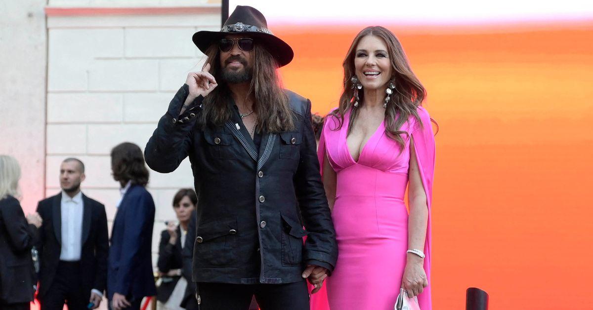 Elizabeth Hurley and Billy Ray Cyrus are 'planning a spontaneous Vegas wedding over the Christmas holidays.'
