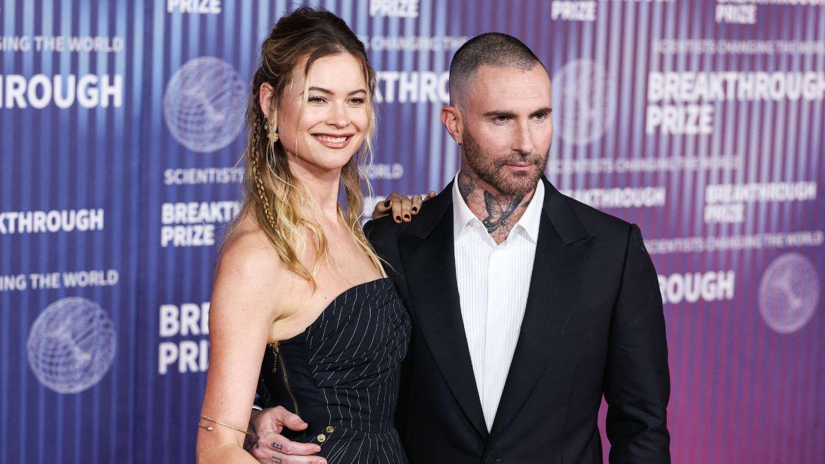Behati Prinsloo continues to check Adam Levine's phone as part of agreed accountability after his 2022 sexting scandal.