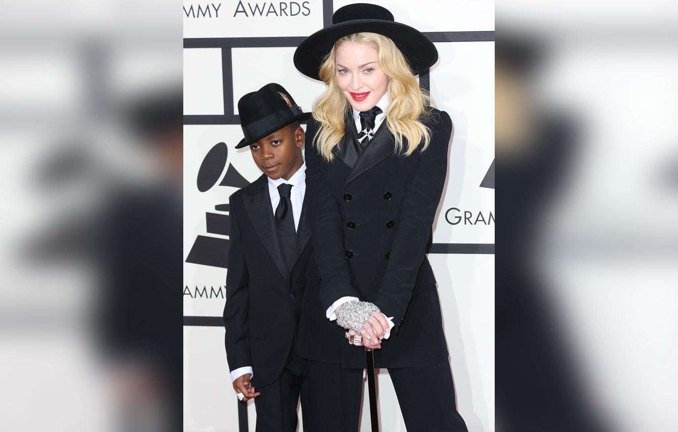 madonna son david banda wears silk white dress